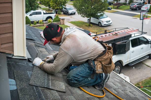 Professional Roofing technician working in Abbotsford, WI